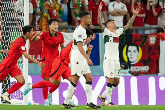 Younggwon Kim of South Korea celebrates the 1-1 goal