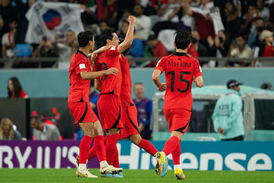 Younggwon Kim of South Korea celebrates the 1-1 goal