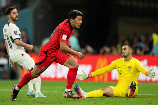 Heechan Hwang of South Korea celebrates the 2-1 goal behind