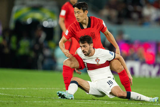 Junho Son of South Korea and Bernardo Silva of Portugal