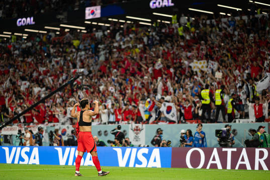 Heechan Hwang of South Korea celebrates the 2-1 goal