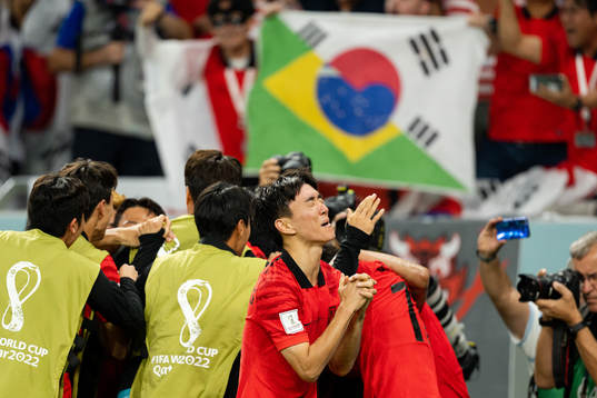 Inbeom Hwang of South Korea celebrates the 2-1 goal by