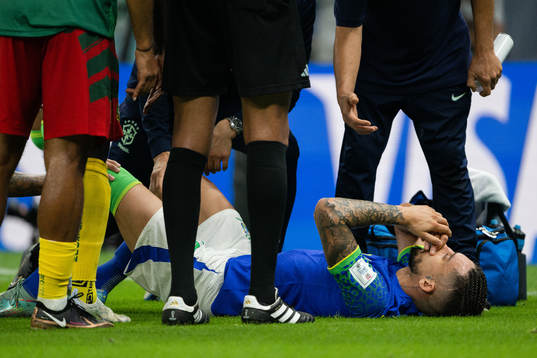 Alex Sandro of Brazil in pain