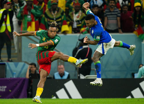 Pierre Kunde of Cameroon and Gabriel Jesus of Brazil