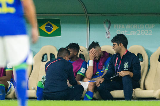 Alex Telles of Brazil in pain