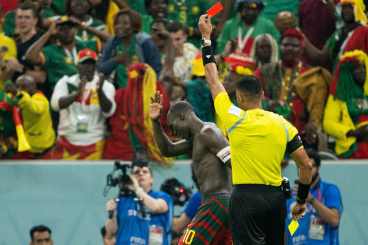 Vincent Aboubakar of Cameroon receives a red card