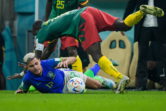 Bruno Guimaraes of Brazil and Vincent Aboubakar of Cameroon