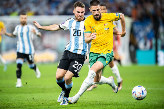 Alexis Mac Allister of Argentina and Milos Degenek of