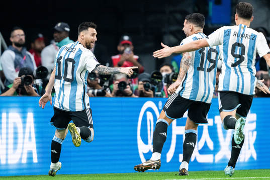 Lionel Messi of Argentina celebrates with Nicolas Otamendi