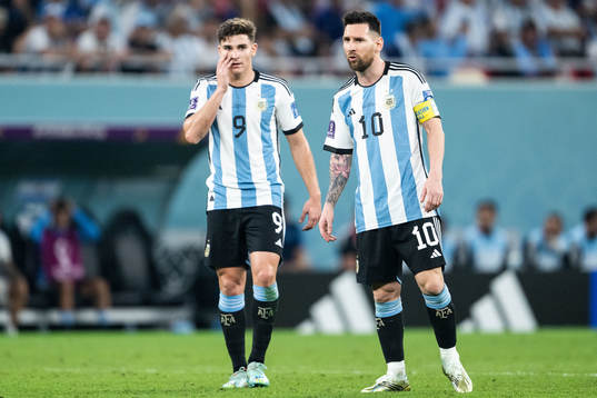 Julian Alvarez and Lionel Messi of Argentina