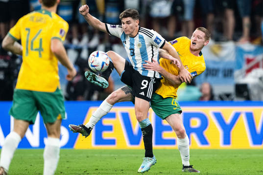 Julian Alvarez of Argentina and Kye Rowles of Australia