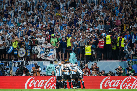 Julian Alvarez of Argentina celebrates with team mates