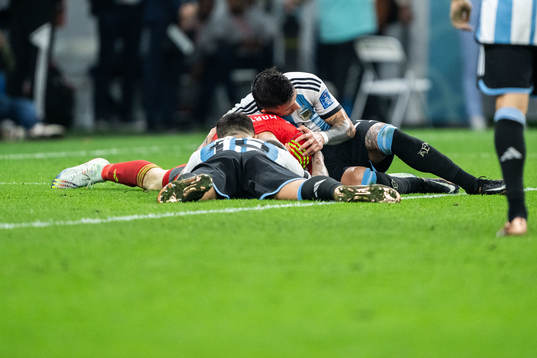 Nicolas Otamendi and Enzo Fernandez of Argentina hugs