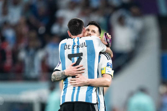Rodrigo de Paul and Lionel Messi of Argentina hugs