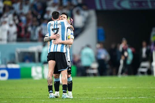 Rodrigo de Paul and Lionel Messi of Argentina hugs