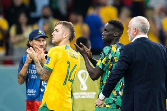Riley McGree and Garang Kuol of Australia look dejected