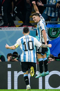 Lionel Messi and Julian Alvarez of Argentina celebrate the
