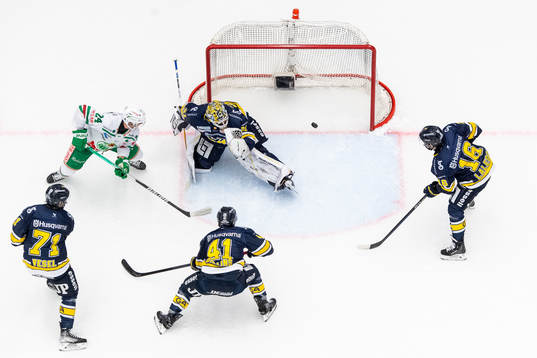 Rögles Marco Kasper oroar framför HV71s Tyler Vesel, Chad