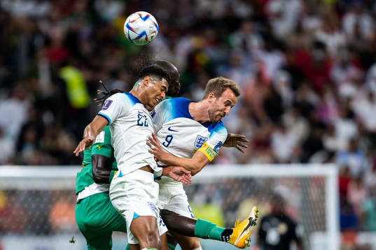 Jude Bellingham and Harry Kane of England and Pathe Ciss