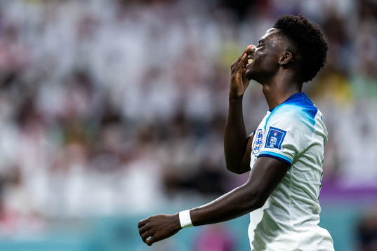 Bukayo Saka of England looks dejected