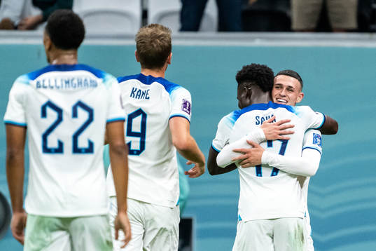 Bukayo Saka of England celebrates 3-0 with Phil Foden of