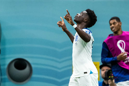 Bukayo Saka of England celebrates scoring 3-0
