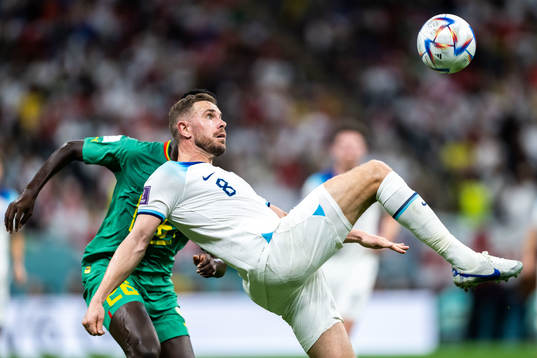 Pape Gueye of Senegal and Jordan Henderson of England