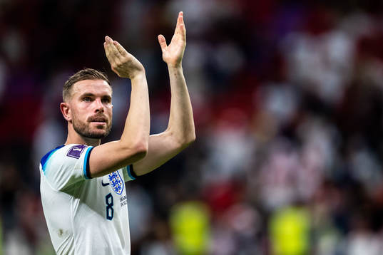 Jordan Henderson of England celebrates