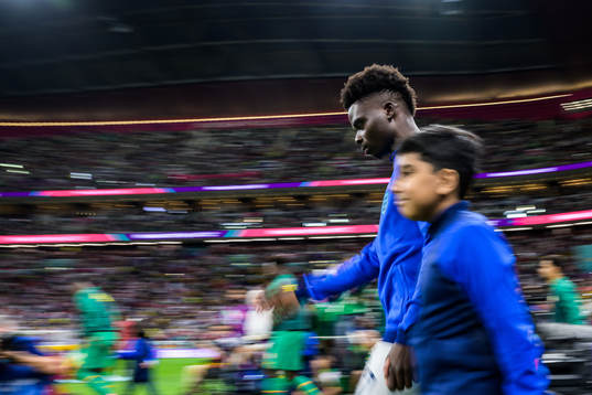 Bukayo Saka of England enters the pitch for the FIFA World