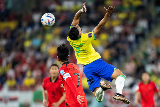 Heungmin Son of South Korea and Lucas Paqueta of Brazil