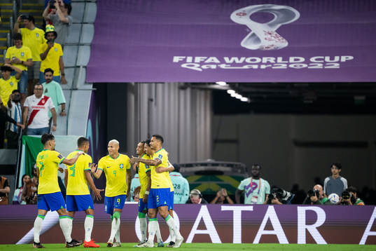 Richarlison of Brazil celebrates with teammates