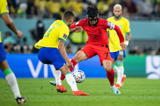 Thiago Silva of Brazil and Heungmin Son of South Korea