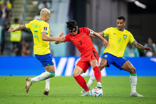 Heungmin Son of South Korea against Richarlison and Danilo