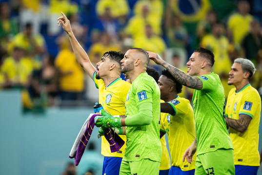 Lucas Paqueta of Brazil celebrates with teammates