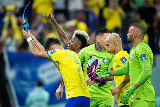 Players of Brazil celebrate