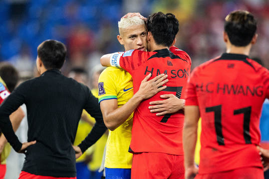 Richarlison of Brazil and Heungmin Son of South Korea