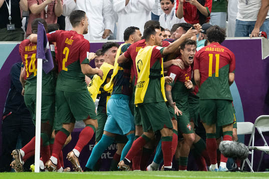 Goncalo Ramos of Portugal celebrates with teammates
