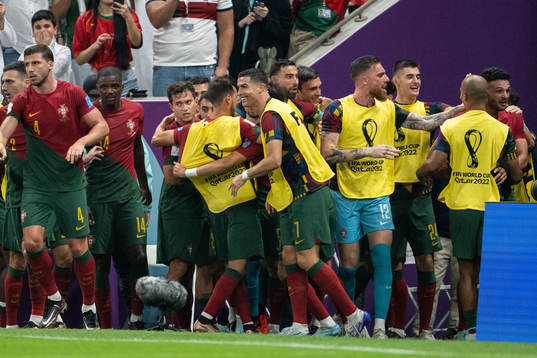 Goncalo Ramos of Portugal celebrates with Cristiano Ronaldo