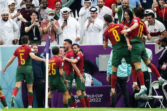 Goncalo Ramos of Portugal celebrates with teammates
