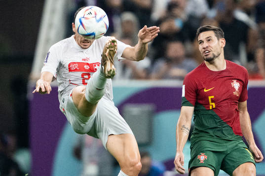 Remo Freuler of Switzerland and Raphael Guerreiro of