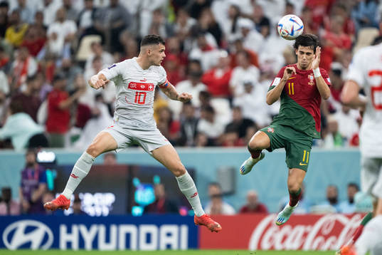 Granit Xhaka of Switzerland and Joao Felix of Portugal