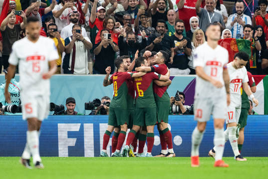 Goncalo Ramos of Portugal celebrates with teammates