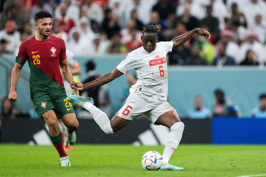 Goncalo Ramos of Portugal and Denis Zakaria of Switzerland