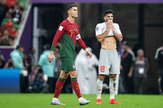 Cristiano Ronaldo of Portugal and Eray Coemert of