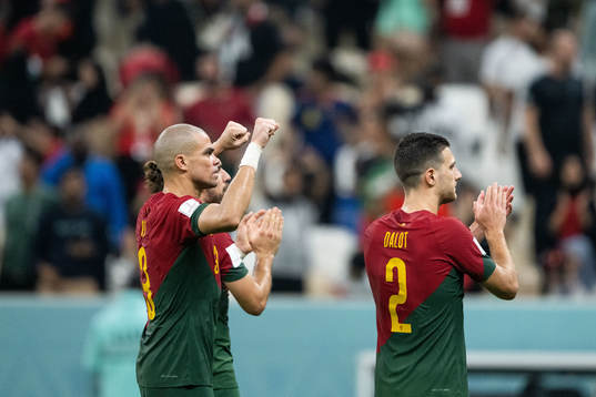 Pepe and Diogo Dalot of Portugal celebrate