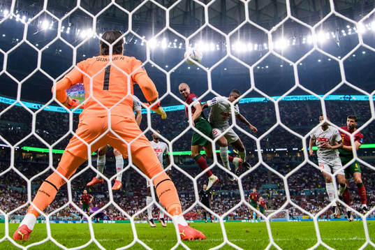 Pepe of Portugal scores the 2-0 goal behind goalkeeper Yann