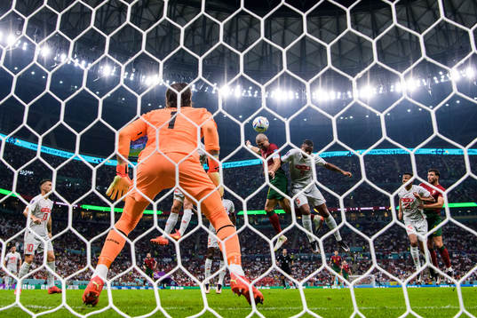 Pepe of Portugal scores the 2-0 goal behind goalkeeper Yann