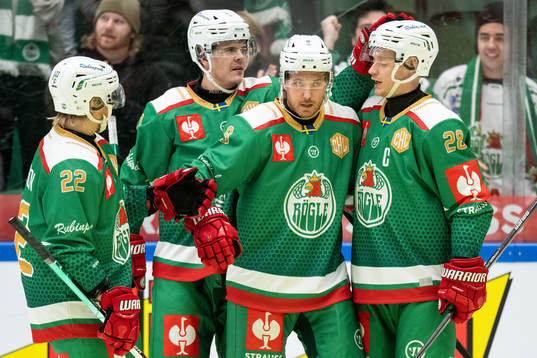 Linus Sandin of Rögle celebrates with teammates