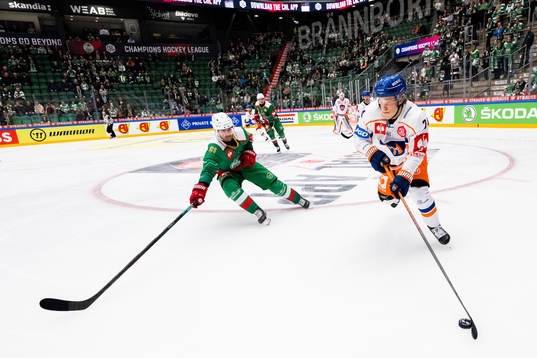 Ludvig Larsson of Rögle and Jere Henriksson of Tappara
