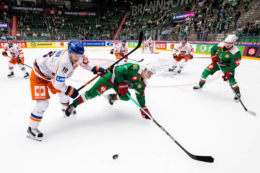 Veli Matti Savinainen of Tappara and Adam Engström of